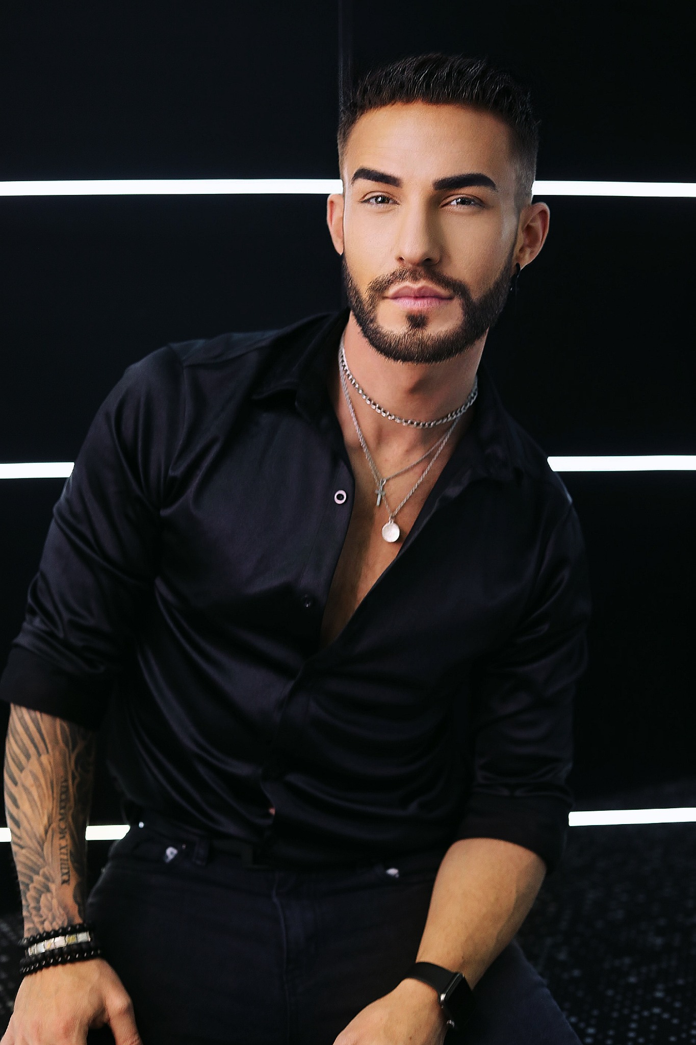 Portrait of Wayne Cumming in a black shirt